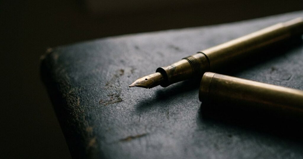 Close-up of a vintage fountain pen on a desk, symbolizing the 30-day sales skill practice plan described in the article.